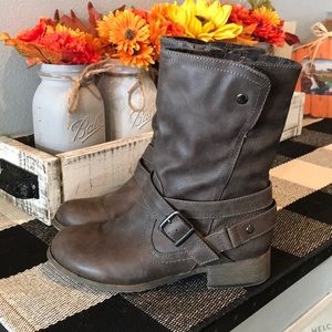 Boots. Buckle accents. Plaid rim.